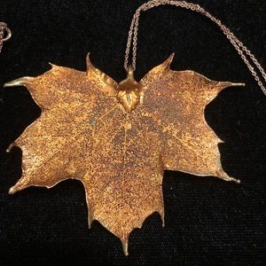 Maple leaf dipped in copper.